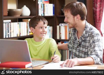 Boy Studying With Home Tutor
