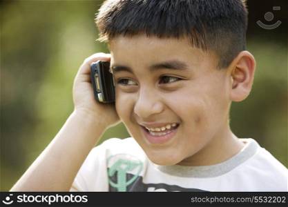 Boy talking on a phone