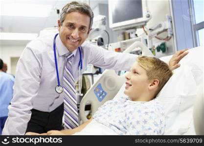 Boy Talking To Male Consultant In Emergency Room