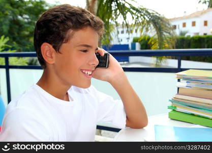 Boy teen talking mobile phone happy smiling student outdoor garden