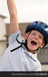 Boy wearing bicycle helmet, close-up