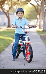 Boy Wearing Safety Helmet Riding Bike