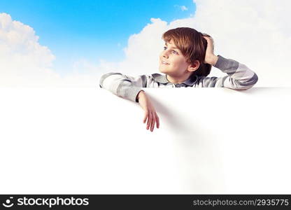 Boy with a blank billboard