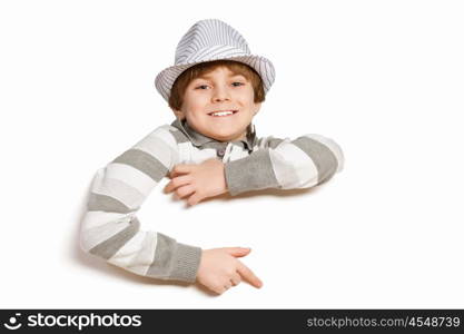 Boy with a blank billboard. Little boy holding a blank white billboard