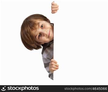 Boy with a blank billboard. Little boy holding a blank white billboard