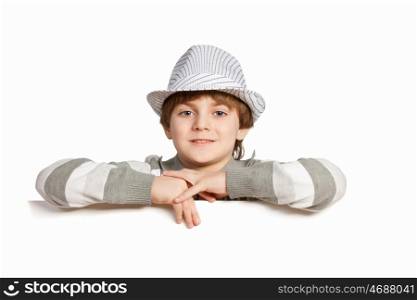 Boy with a blank billboard. Little boy holding a blank white billboard