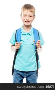 boy with backpack ready to go to school, portrait on white background isolated