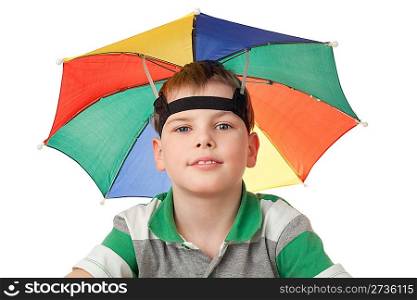 boy with multi-coloured umbrella on head isolated on white background