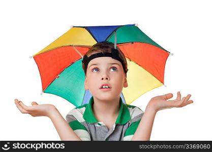 boy with multi-coloured umbrella on head spread his hands aside isolated on white background