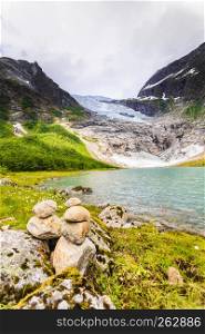 Boyabreen Glacier and lake landscape in Fjaerland area, Sogndal Municipality in Sogn og Fjordane county, Norway.. Boyabreen Glacier and lake in Norway
