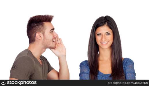 Boyfriend talking a secret his girlfriend isolated on a white background