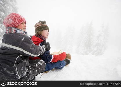 Boys on toboggan