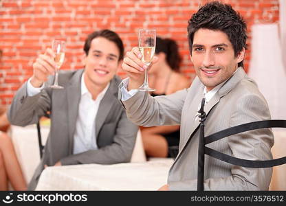 Boys with a glass of champagne