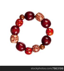 bracelet made of wood red and brown color isolated on white background