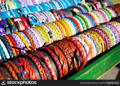 Bracelets of leather in colorful colors hand crafted in an outdoor market