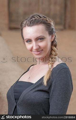 Braided Russian Women young with one braid - portrait of the pretty brown haired women