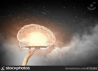 Brain on metal tray. Hand holding metal tray with human brain symbol