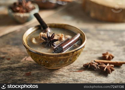 Braised pork ribs with cinnamon and star anise.