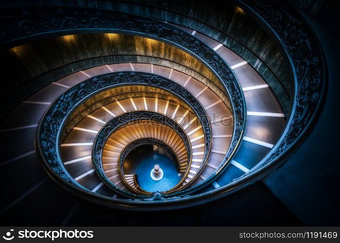 Bramante Staircase in Vatican Museums in the Vatican City , Rome , Italy . The double helix staircase is is the famous travel destination of The Vatican and Rome , Italy.