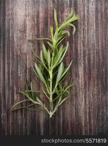 Branch Of Rosemary Isolated On A Cutting Board