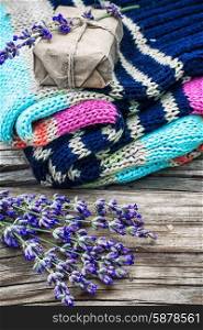 branches of blooming lavender and wool items