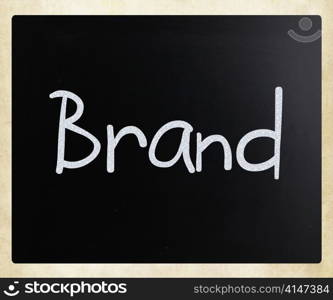 ""Brand" handwritten with white chalk on a blackboard"
