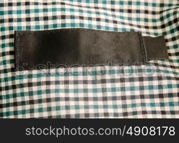 brand tag on a finest-quality shirt - close up