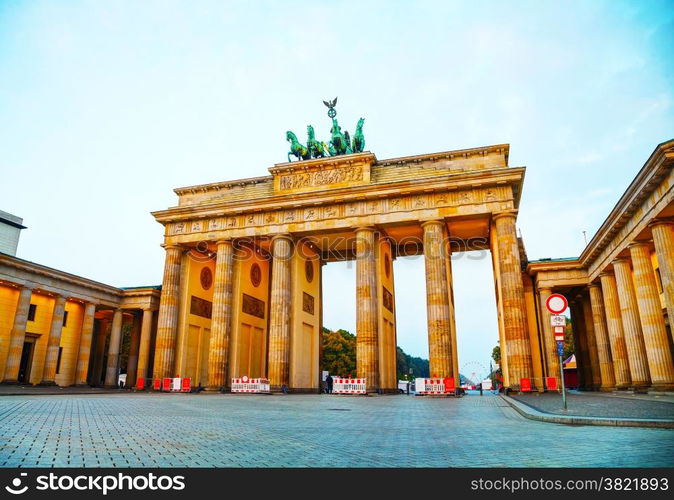 Brandenburg gate (Brandenburger Tor) in Berlin, Germany at sunrise