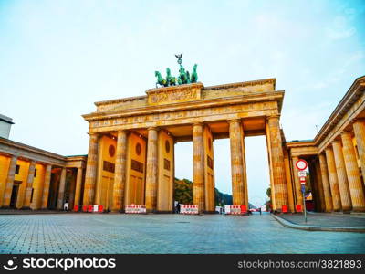 Brandenburg gate (Brandenburger Tor) in Berlin, Germany at sunrise