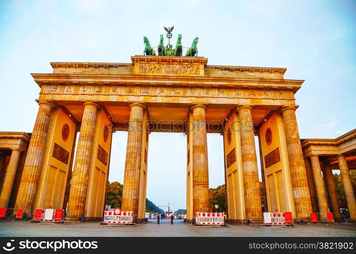 Brandenburg gate (Brandenburger Tor) in Berlin, Germany at sunrise