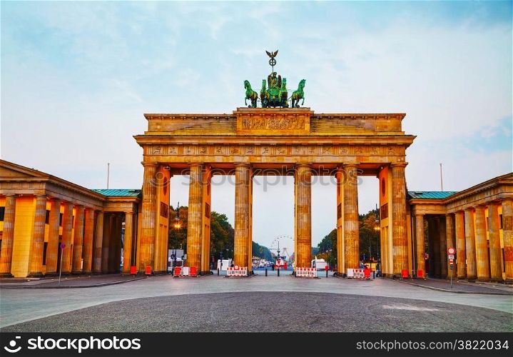 Brandenburg gate (Brandenburger Tor) in Berlin, Germany at sunrise