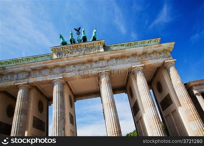 Brandenburg Gate. German Brandenburger Tor in Berlin, Germany. Sunny blue sky