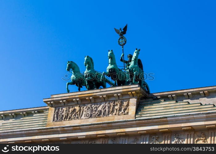 Brandenburg Tor detail. Berlin, Germany. Victory and Fame often are depicted as the triumphant woman driving the chariot.