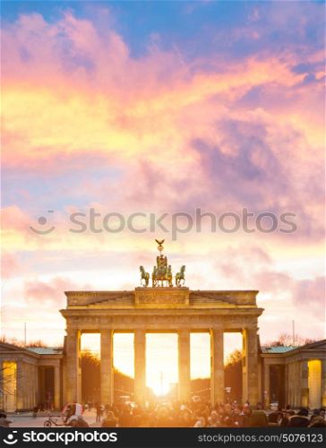 Brandenburger Tor auf Pariser Platz. Illuminated Brandenburg Gate sunset view, Berlin, Germany