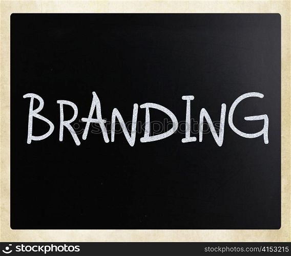 ""Branding" handwritten with white chalk on a blackboard"