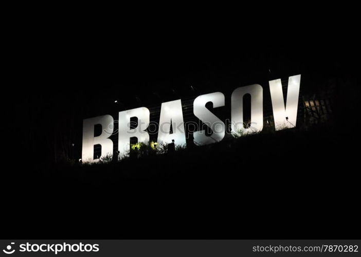 brasov city name in volumetric letters night on Tampa mountain