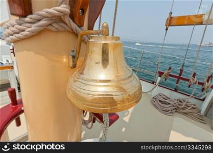 Brass bell on the private sail yacht.