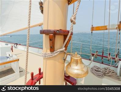 Brass bell on the private sail yacht.