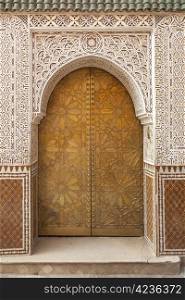 Brass decorated Moroccan door in Marrakesh, Morocco, April 1, 2012