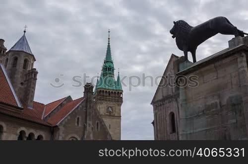 Braunschweig old buildings and lion statue near Dom, timelapse