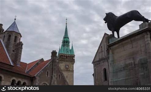 Braunschweig old buildings and lion statue near Dom, timelapse