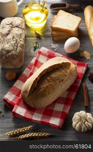 bread and bakery products on wood background