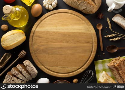 bread and bakery products on wooden background