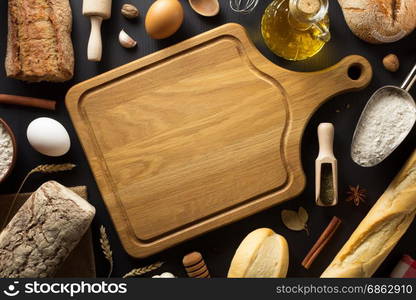 bread and bakery products on wooden background