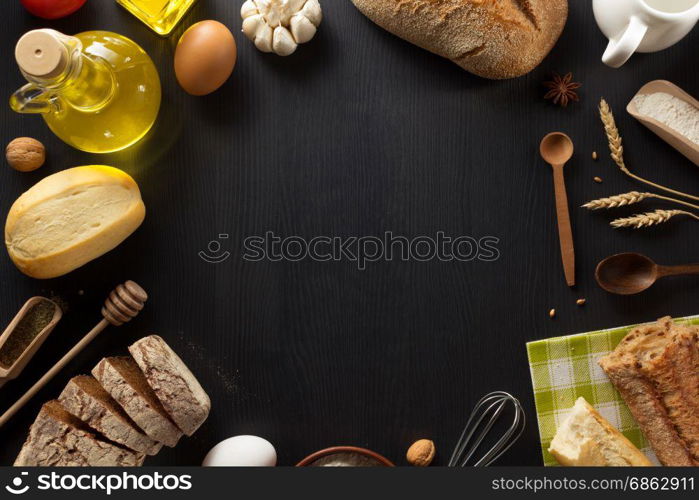 bread and bakery products on wooden background