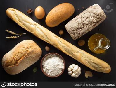 bread and bakery products on wooden background