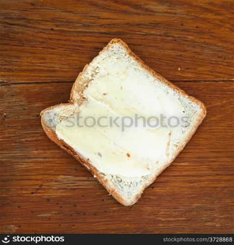 bread and butter sandwich on wooden table