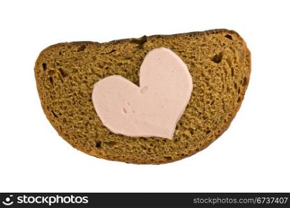 Bread and heart shaped sausage. Isolated on white