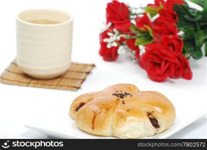 Bread, chinese tea and rose