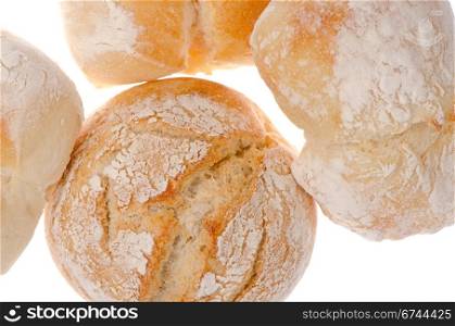 Bread closeup on top of wooden table background.